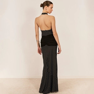 Elegant halter neck polka dot maxi dress with backless design and cinched waist