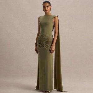 Detail of olive green sleeveless maxi dress featuring pleated waist and long floor-length cape