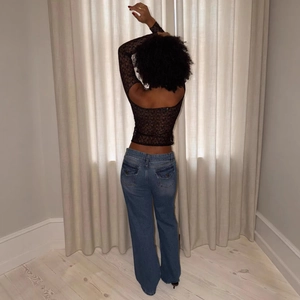 Chic black lace off-shoulder long sleeve top paired with vintage blue denim jeans