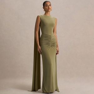 Detail of elegant olive green ruched maxi dress with dramatic shoulder cape drape detail