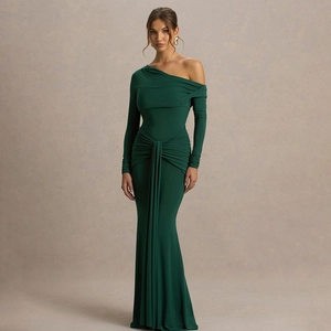 Detail of elegant dark green one-shoulder dress with side draping and ruched texture