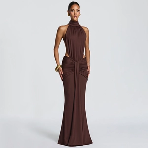 Detail of chocolate brown halter neck dress showing side cutouts and ruched waist