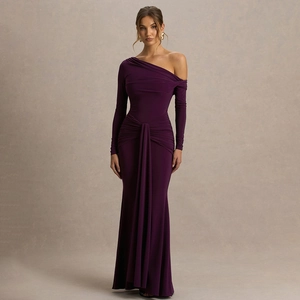 Detail of elegant dark purple one-shoulder evening gown with pleated waist and long sash
