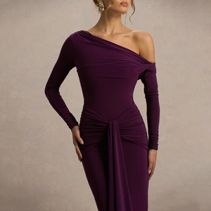 Detail of deep purple off-shoulder evening dress with elegant waist pleats and side sash