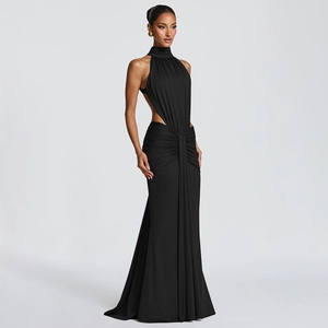 Detail view of sexy backless halter neck dress with waist cutouts and ruched design