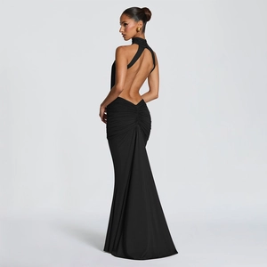 Elegant backless halter dress showing cutout waist and ruched fishtail details