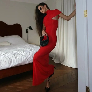 Detail of red floor-length gown featuring high neck design and side shoulder cutout detail