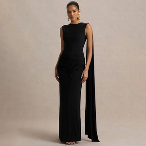 Elegant black backless sleeveless maxi dress with waist pleats and floor-length cape
