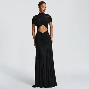 Close-up of ruched high-neck bodice and diamond-shaped waist cut-out on black evening gown