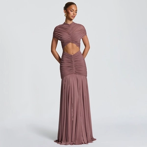 Detail of mauve ruched maxi dress featuring cut-out waist and elegant draped mesh fabric