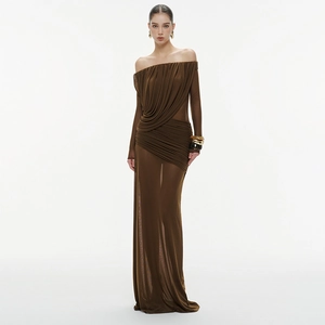 Detail of elegant draped brown mesh fabric with ruched texture on a long maxi dress