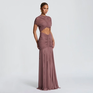 Detail view of ruched fabric and waist cutout on a dusty rose mesh maxi dress