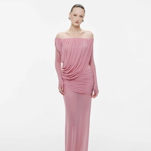 Close-up of pink off-shoulder mesh dress with elegant ruched and draped detailing