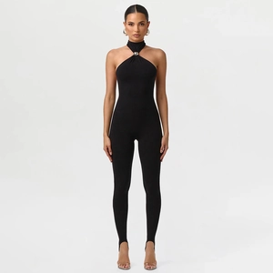 Detail of black halter jumpsuit with metal ring neck buckle and stirrup leggings