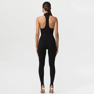 Back view of sexy black racerback bodysuit with sleeveless halter neck and stirrup pants