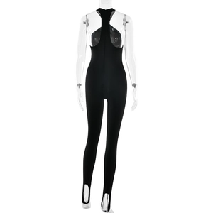 Back view of black stirrup jumpsuit with racerback cut and hidden zipper closure