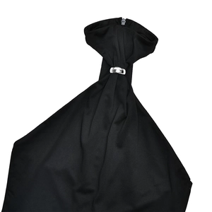 Detail view of black halter neckline featuring a silver metal ring buckle and size S label