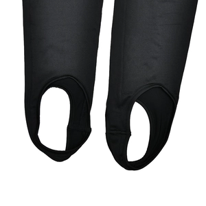 Close-up of stirrup leggings detail showing elastic foot loop and smooth stitching