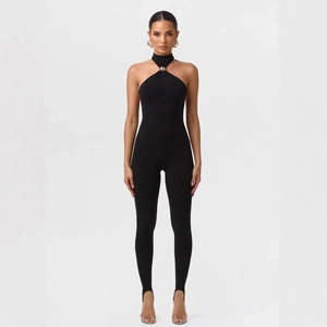 Sleek black halter neck jumpsuit with silver metal ring and stirrup leg design