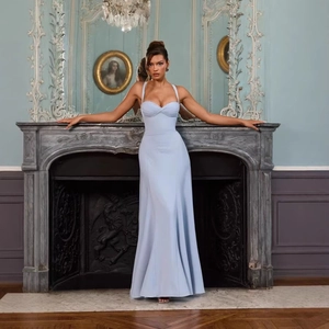 Detail of light blue sweetheart neckline and fitted bodice on a pleated maxi dress