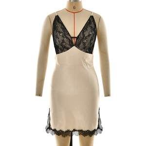 Elegant champagne satin nightdress with deep V-neck black lace trim and side slit
