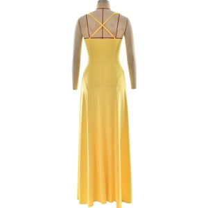 Detail view of the backless design with cross straps on a bright yellow evening dress