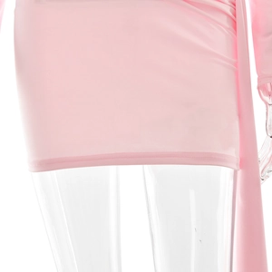 Close-up of pink bodycon dress featuring elegant side drapes and premium knit texture