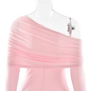 Detail of light pink one-shoulder dress with elegant ruched pleats and long sleeve design