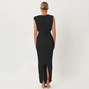 Detail view of black bodycon dress featuring elegant back drapes and pleated design