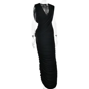 Detail view of the deep V-neckline and elegant ruched texture on the black midi dress