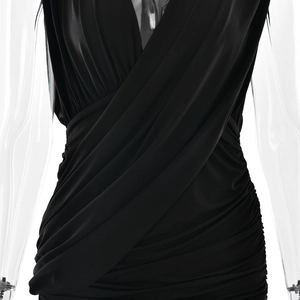 Detail of cross-drape and side shirring on black deep V-neck sleeveless slim bodycon dress