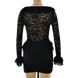Detail of sheer black floral lace texture on back of ruffle sleeve bodycon dress