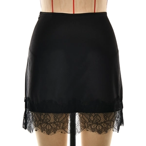 Elegant black satin mini skirt with intricate floral lace trim and slimming high waist