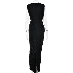 Detail view of ruched fabric texture and draped back design on this black slim dress