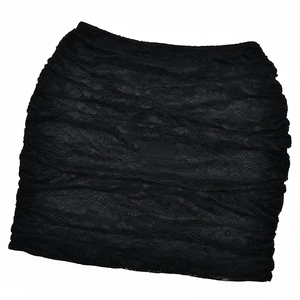 Detail of black lace mini skirt featuring textured horizontal ruched ruffles and layers