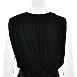 Detail of elegant back draping and waist pleats on a black sleeveless bodycon dress