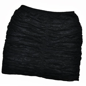 Detail of black lace ruched mini skirt with textured floral mesh and elastic waistband