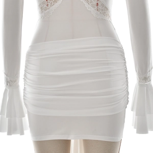 Detail of ruched white dress with delicate lace flared cuffs and mesh fabric texture