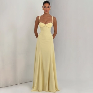 Elegant pale yellow backless maxi dress with sweetheart neckline and pleated fishtail hem