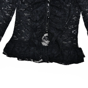 Detailed view of black floral lace top with ruffled edges and small beaded buttons