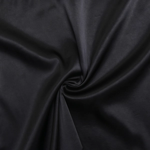 Detailed macro view of the premium black satin fabric texture and silky smooth luster