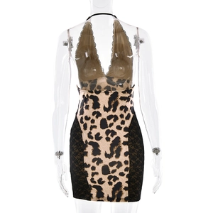 Detailed view of leopard print dress with lace patchwork and halter neck design
