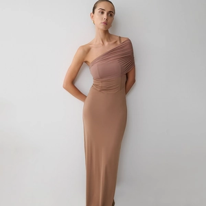 Detailed view of the brown color-block one-shoulder dress with elegant pleated bodice
