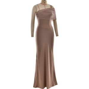 Detail of the one-shoulder draped tulle and pleated waist on this slim fit evening dress