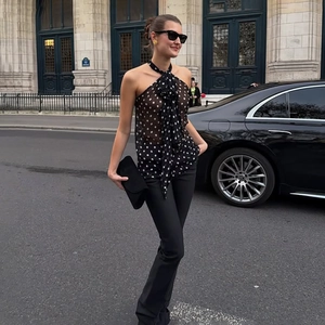 Polka dot halter neck sleeveless top with bow tie detail for elegant summer office wear