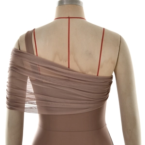 Close-up of the elegant mesh pleats and ruffled shoulder detail on a slimming brown dress