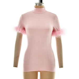 Pink mock neck slim-fit short sleeve top featuring elegant feathered sleeve cuffs