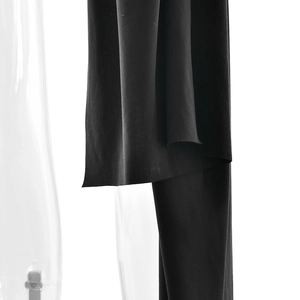 Detail view of smooth black fabric with professional draping and neat tailoring edges
