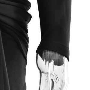 Detail of black long sleeve dress featuring side ruched seams and flatlock stitching