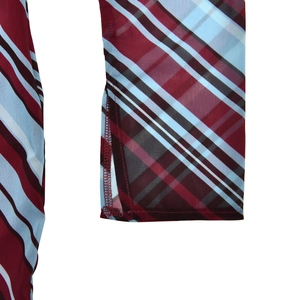 Detailed close-up of burgundy and blue striped chiffon sleeve with side slit detail